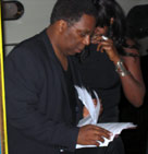 Henry checking out Val's setlist for the night.